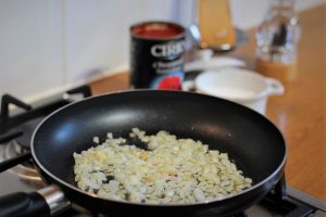 frying onions for tomato sauce