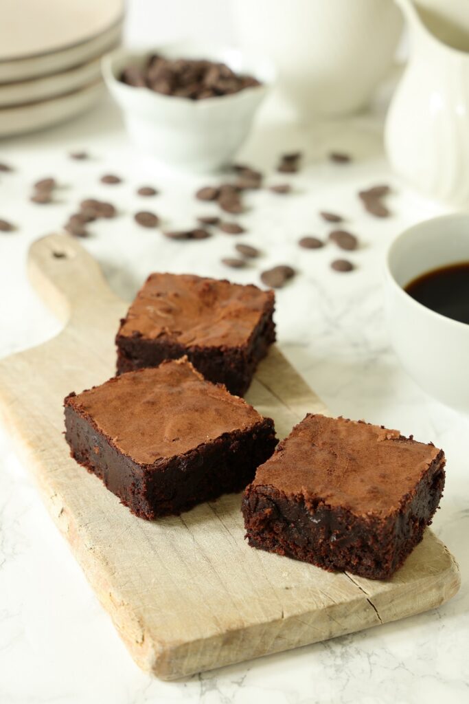 Chocolate brownies served with coffee